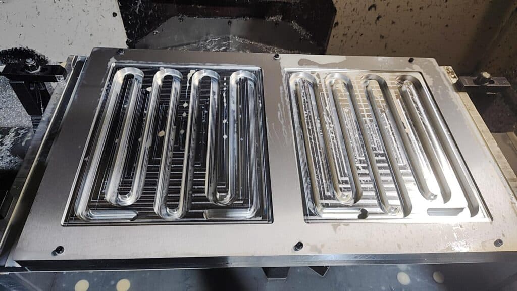 CNC machined aluminum liquid cold plate with coolant flow channels