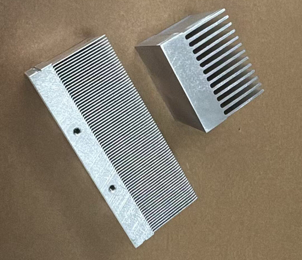 Extruded and skived aluminum heat sinks for IGBT power module cooling